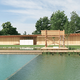 Illustration for article titled This Chlorine-Free Pool Is Biofiltered and Freaking Beautiful